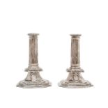 A pair of William III silver candlesticks by Richard Syng, London, 1698