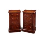 A small pair of mahogany bedside chests