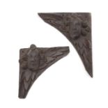 A pair of carved oak door spandrels, possibly East Anglian, circa 1500-1550