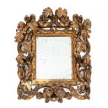 An early 17th century Italian carved giltwood mirror/frame, possibly Rome