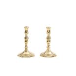 A pair of brass baluster candlesticks, French, early 18th century