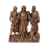 A carved limewood figural group, probably South German, circa 1700