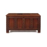 A Charles II oak panelled chest, mid 17th century