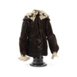 A 17th century style black silk and white lace doll’s jacket