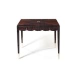 A 1930's Art Deco ebony and ivorine inlaid side table