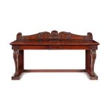 A Regency Irish carved mahogany serving table in the manner of Mack Williams and Gibton