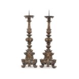 A pair of large late 19th century beechwood carved pricket candlesticks in the 17th c style