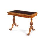A George IV satinwood carved writing table by Gillows