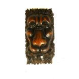 A group of lion mask carved fragments, mostly 19th century