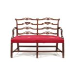 A George III mahogany double chair-back settee