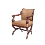 A Louis Philipe mahogany leather upholstered fauteuil or desk chair