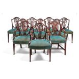 A matched set of ten George III mahogany Hepplewhite style dining chairs