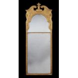 A George I carved giltwood and gesso pier mirror