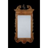 A George II walnut and parcel gilt mirror