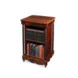 A small early Victorian rosewood and satin birch double-sided bookcase