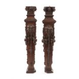 A pair of 19th century oak carved pilasters