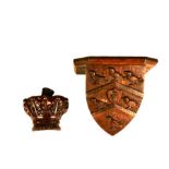 A group of 19th-century armorial carved and decorated shields