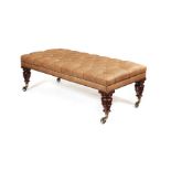A 19th century leather upholstered carved mahogany stool
