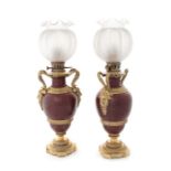 A pair of late 19th century French rouge marble and gilt bronze mounted lamp bases
