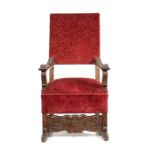 A 19th century Flemish walnut open armchair, in the late 17th century style