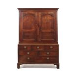 A George III oak press cupboard, West or North Wales