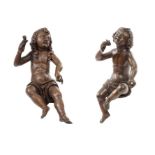 A pair of 18th/19th century Flemish carved oak architectural figures of seated angels