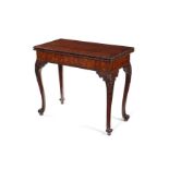 A George III carved mahogany concertina-action card table