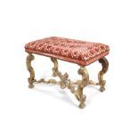 A Louis XV carved gilt wood stool