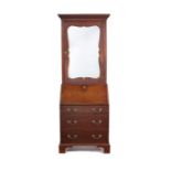 A small George III mahogany bureau bookcase