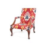 A George III mahogany carved 'Gainsborough' type open armchair