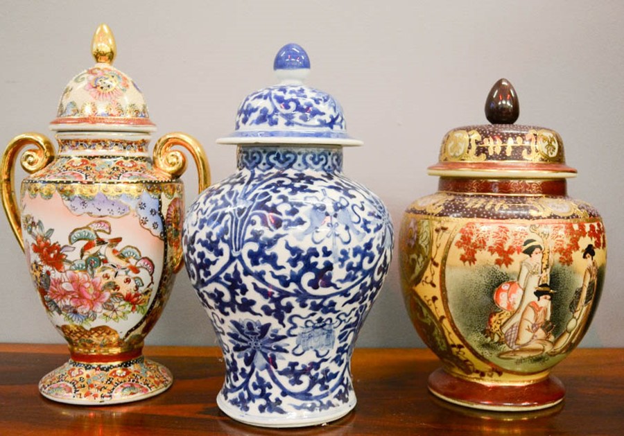 Three Chinese 20th century jars and covers, one blue and white and the others with gold pipework