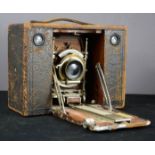 An early Kodak camera, the dial dated January 5th 1897, in leather case bearing handle stamped