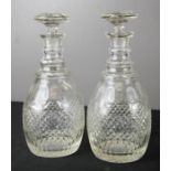 A pair of cut glass 19th century decanters, one A/F.