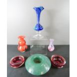 A group of vintage glassware, to include tall stem vase, orange bud vase, two red dishes and a '