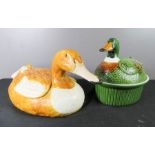 Two ceramic tureens in the form of ducks.