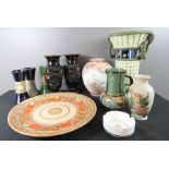 A group of ceramics including a Crown Ducal Charlotte Rhead charger three stoneware vases, a pair of