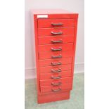 A Ryman red stationary cabinet.