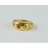 A 15ct gold, ruby and diamond ring, size L, 4.8g.