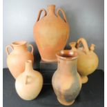 Five large terracotta vases / jars.