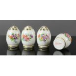 A set of 20th century Dresden porcelain shakers, hand painted with flowers.