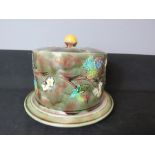 A Victorian cheese dish and cover, embossed and painted with flowers, 20cm high.