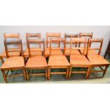 A set of ten Victorian oak dining chairs.