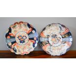 Two Imari chargers, with scalloped edges, both approximately 32cm diameter.