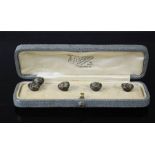 A set of five Victorian buttons in original presentation case.