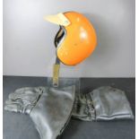 A Boys Brigade Helmet and gloves.