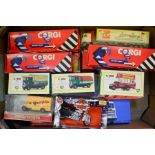 A group of boxed Corgi vehicle models, and other boxed model vehicle examples.