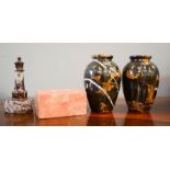 A group of marble items to include a pair of vases, a trinket box and a light house form