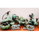 A quantity of BMP Canadian pottery including dolphin, bull, cat, tiger, bird, jug and vase and other