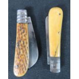 Two German bone handled folding penknives.