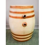 A large stoneware barrel, circa 1900.